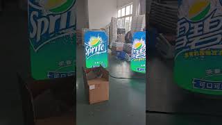 A Coke bottle-shaped screen made with LEDs#Sprite#Pepsi#Coca Cola