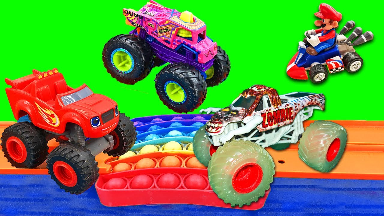 Hot Wheels Monster Trucks Vs Blaze And The Monster Machines | Monster Jam  Grave Digger Battle Cars - Youtube