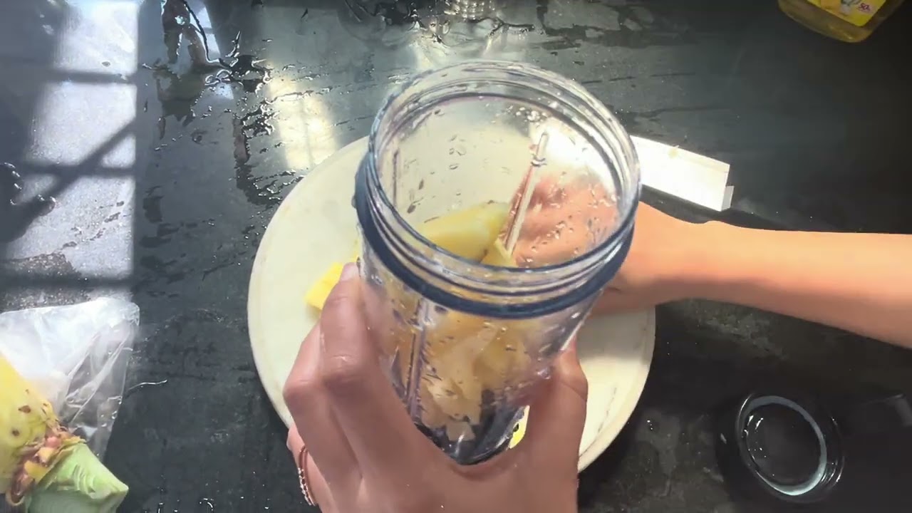 Using my portable juicer to make instant pineapple juice 
