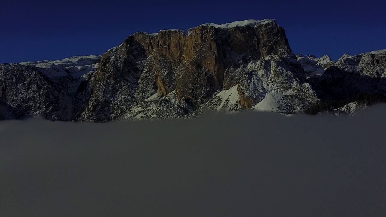 Dolomites UNESCO peaks above the clouds