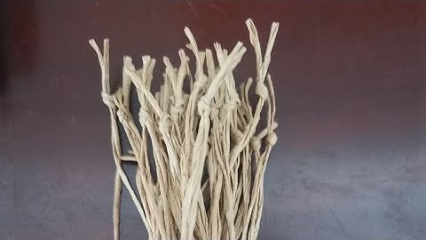 Elastic string knotting machine