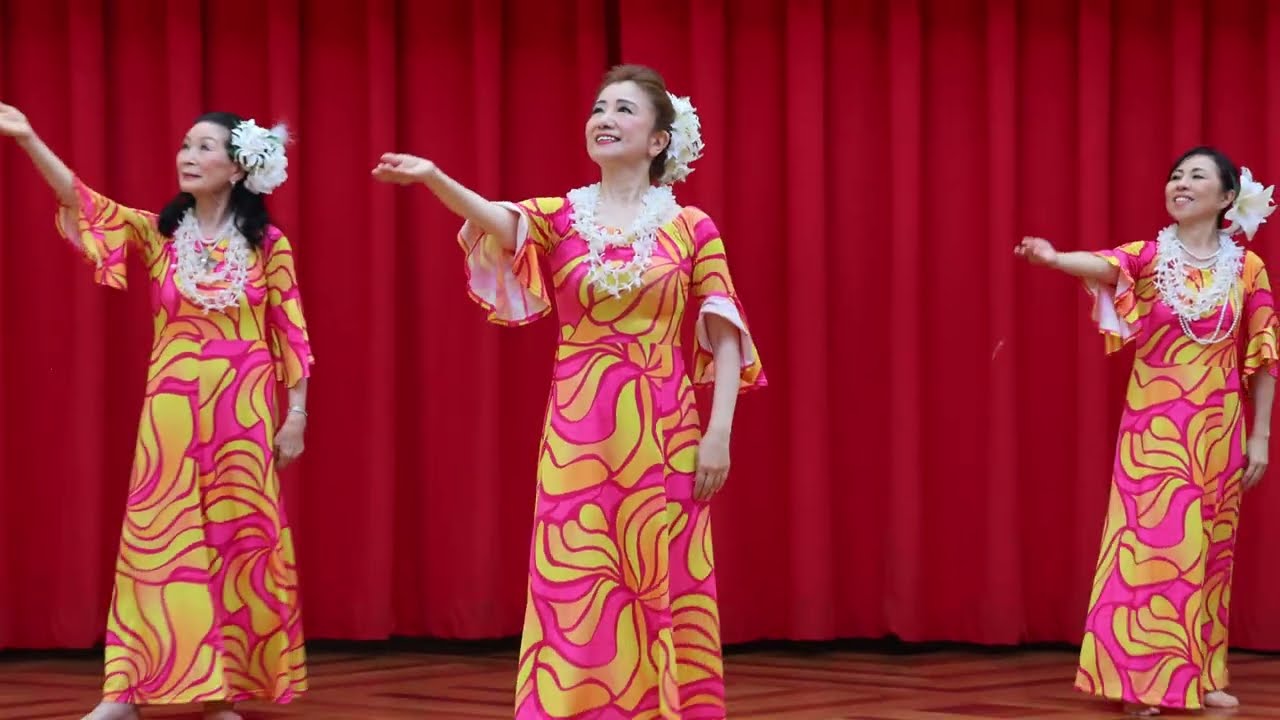 KHAʻOhana Shines in “Kuʻu Sweet Lei Makamae” Hula in Floral