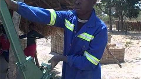 Making an Interlocking Stablised Soil Block in Zambia - Build It International