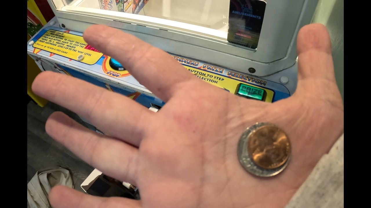 Found strange coins glued together while collecting money from claw machines