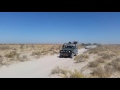 Defender and Discovery 3 in the Kalahari