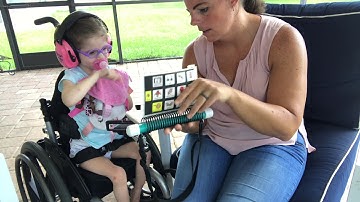 Harper and Mom taking back and forth using PODD