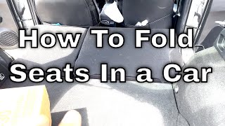 How To Lay Down Rear Seats in a Car