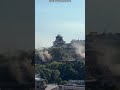 Dust Clouds Rise at Kumamoto Castle After Powerful Japan Earthquake | DWS News | AP1C
