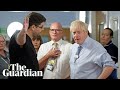 Boris Johnson confronted by father of sick child over NHS waiting times