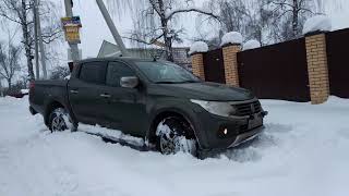 Fiat Fullback in snow with lame driver
