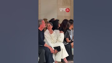 📹 Watch the moment #MeghanMarkle is caught giggling as a model stumbles over at #ParisFashionWeek