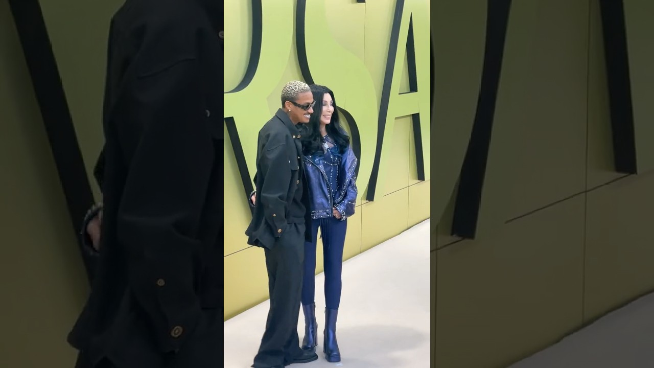 Cher with boyfriend AE at the Versace fashion show 