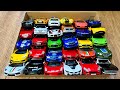 Box full of various miniature cars peugeot volvo renault hyundai pagani cadillac one dhl 8