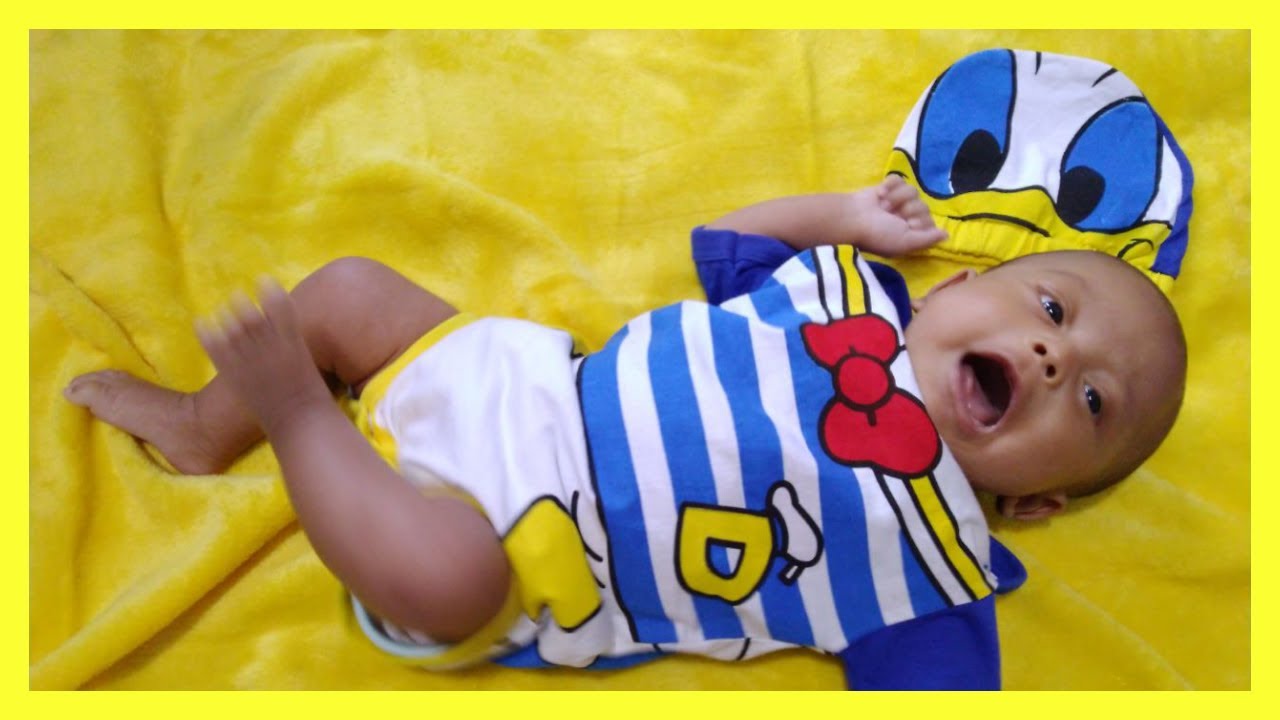 Video Cara Memakaikan Pakaian Bayi  Jumper  Donald Duck 