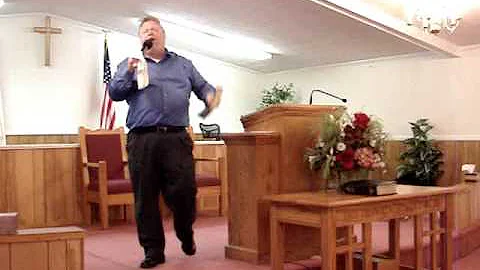 Bro. Roy Vogan preaching at Lesslie Church of God-...