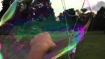 Giant bubble popping in slow motion