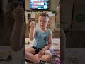 Henry opening Stitch Doorables!