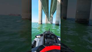 Insane riding Jet Ski under Skyway Bridge with massive ship