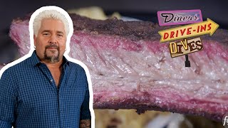 Guy Fieri Eats Righteous Wings \& MASSIVE Beef Ribs | Diners, Drive-Ins and Dives | Food Network