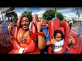 Big Breasts women ride rollercoaster.