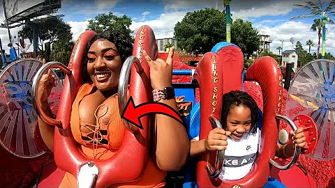 Big Breasts women ride rollercoaster.