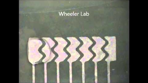Digital microfluidic droplet manipulation on a device formed by laser-printing on a PCB substrate