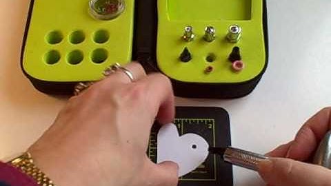 Scrapbooking Video - Using the Silent Eyelet-setter