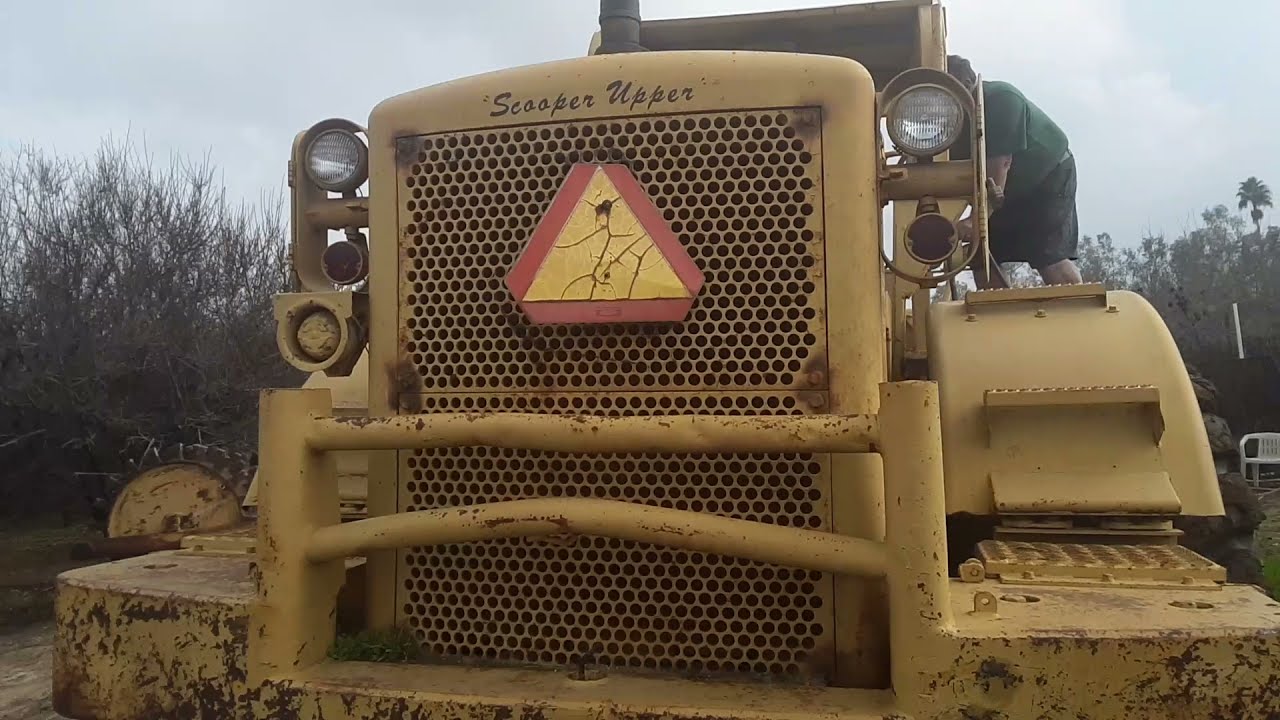 Take a ride on a Caterpillar 988 bucket loader