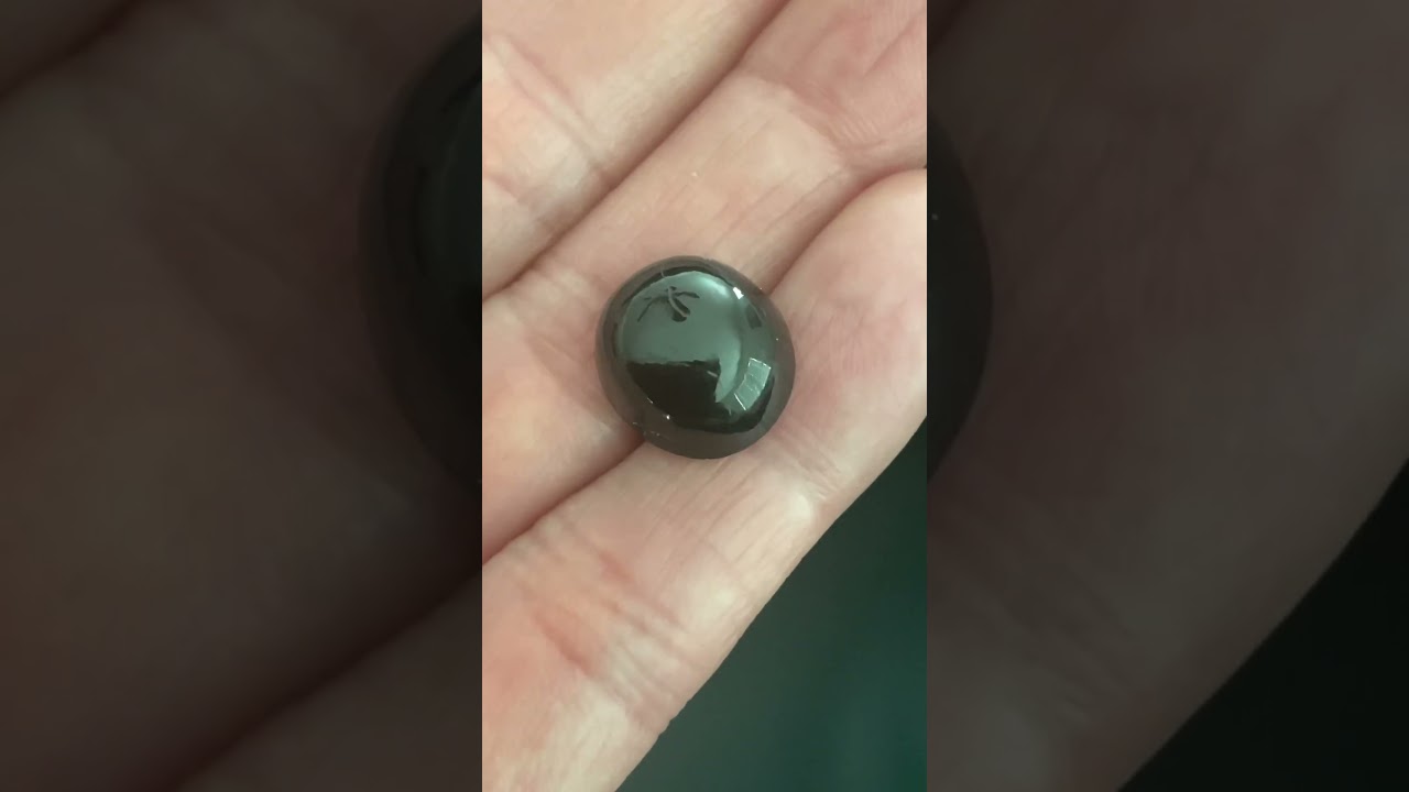 W7405-black-spinel-cabochon-arizona-10.11-ct-ravenstein