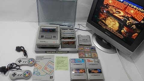 Super Famicom + Rare acrylic station case + a lot games