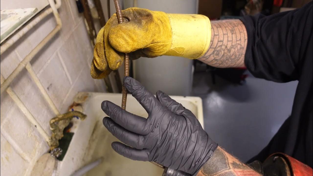 Why do plumbers put the cleanout that low. How to unclog a laundry sink