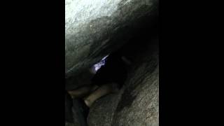 Enchanted Rock finding our way through cave.
