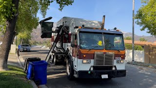 Peterbilt 320 Amrep Garabge Truck Revving Hard