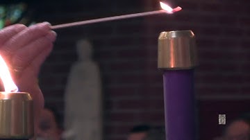 Lighting the Advent candle on the Second Sunday of Advent