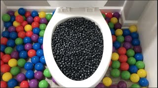 Will it Flush? - Plastic Balls and Black M&M's