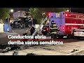 #MientrasDormía: Conductora ebria derriba semáforos en Av. Talismán, en GAM, CDMX.