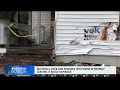 SUV rolls over into Massachusetts home after crash