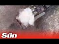 Ukrainian drone drops bomb into open Russian tank hatch with precision