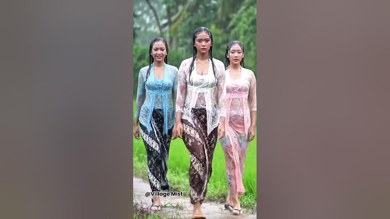 Village Rain Walk – Graceful Kebaya in Misty Rice Fields #shorts  #viralshorts