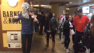 Violin Monster plays for students waiting to vote at U-M Union