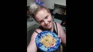 cooking spicy Alfredo pasta with imitation crab meat and bell pepper