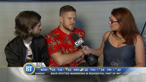 Imagine Dragons Wayne Sermon and Dan Reynolds with their album 