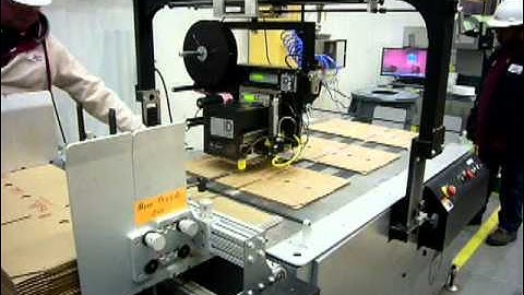 Label Printer Applicator on Knock Down Cases