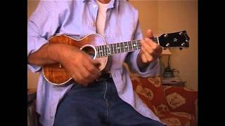 George Harrison plays the Ukulele at home