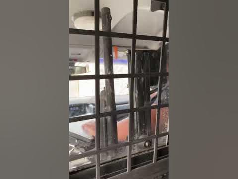 Sitting in the back of a police car - YouTube