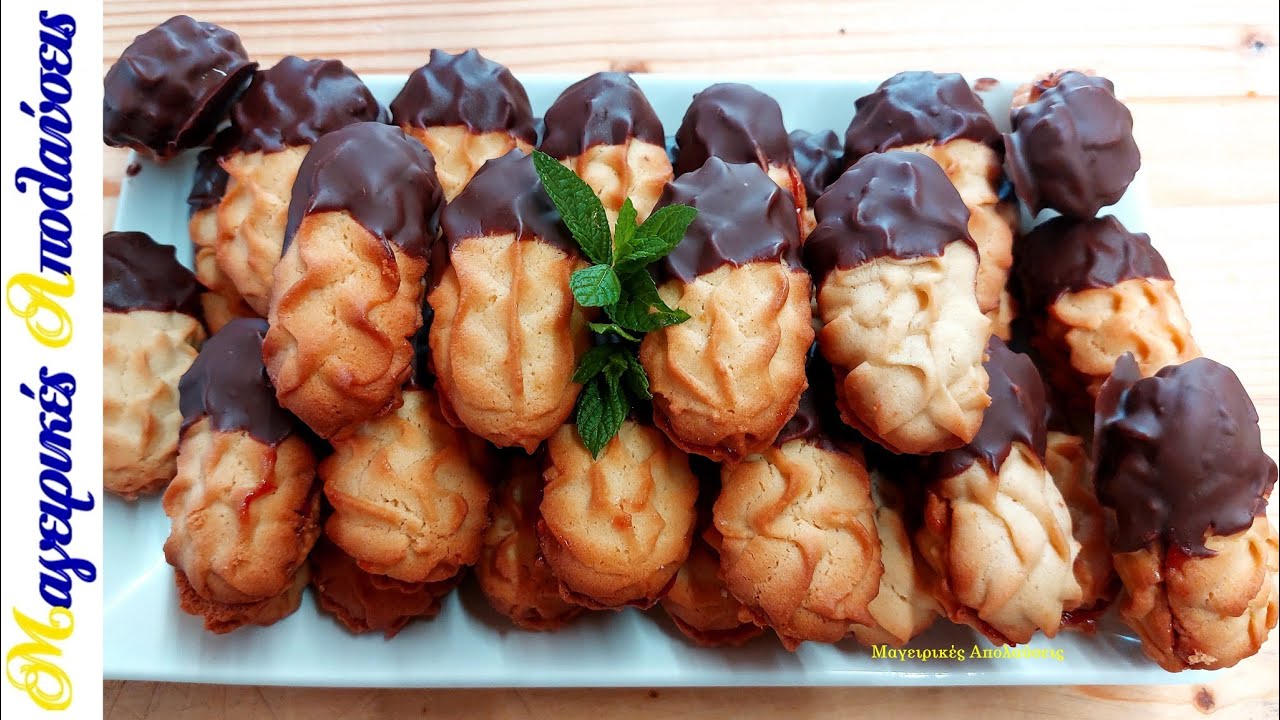 Легкие и пышные печенья пети фор с начинкой из джема и шоколадной глазурью.