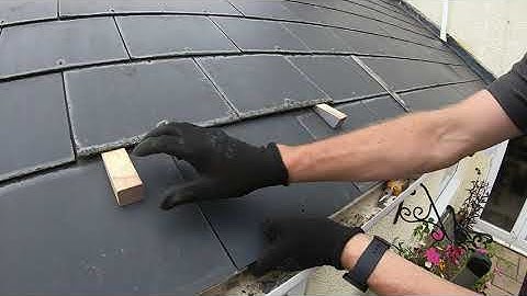How to replace a fibre cement roof slate. (And finding the original bodge job hidden underneath it!)
