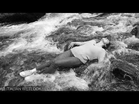 Wetlook - Leyla in river with white&pink Nike, jeans and sweater