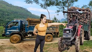 the driver and the girl driving a car,tractor carrying wood on the mountain.