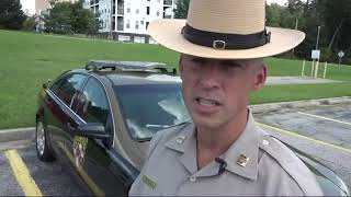 Man distracted by phone, hits police car in Md.